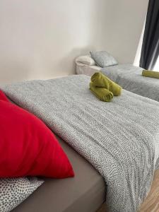 Posteľ alebo postele v izbe v ubytovaní Downtown Apartments