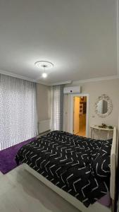 a bedroom with a large bed in a room at Paradice App in Istanbul