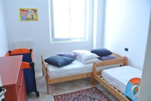Posteľ alebo postele v izbe v ubytovaní Romeo Apartments