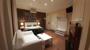 Ένα ή περισσότερα κρεβάτια σε δωμάτιο στο Hostal Petit Príncep