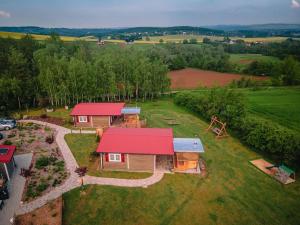 an aerial view of a house with a red roof at Domki na Górniej Łące - Domek Słowik in Łazany