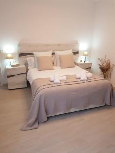 Postel nebo postele na pokoji v ubytování Apartaments L’ARC