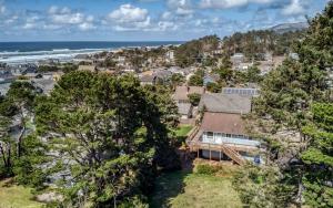 an aerial view of a residential neighborhood with the ocean at Lincoln House in Lincoln City