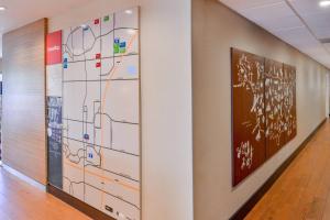a map on a wall in a hallway at TownePlace Suites by Marriott Ontario Airport in Rancho Cucamonga