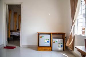 Postel nebo postele na pokoji v ubytování Skybird Homestay