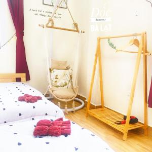 Postel nebo postele na pokoji v ubytování Dốc homestay Đà Lạt