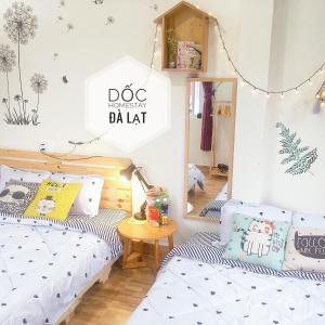 Postel nebo postele na pokoji v ubytování Dốc homestay Đà Lạt