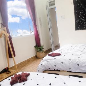 Postel nebo postele na pokoji v ubytování Dốc homestay Đà Lạt