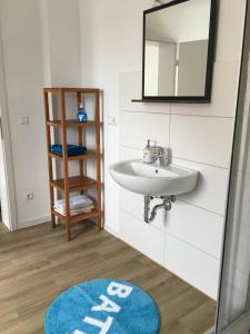 Koupelna v ubytování Apartment im Stadthaus + 10 fotografií