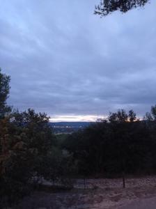 a view of the sky from a hill with trees at Les Cigales in Villelaure +47 photos