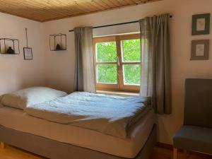 Posteľ alebo postele v izbe v ubytovaní Appartement Josef im Bauernhaus Edt + 37 fotografií