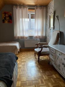 Łóżko lub łóżka w pokoju w obiekcie entre vignes et montagnes chambres