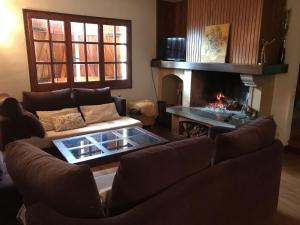 A seating area at Casa de muntanya Can Coll de Susqueda Girona