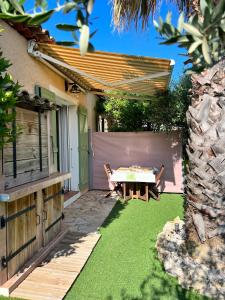 Zahrada ubytování Bastide du Levant - 50m plage - Rez de jardin