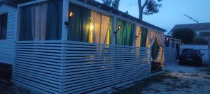 a house is shown with lights on it at Mobile Homes Inalex Relax in Privlaka