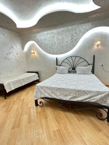 Yerevan Guest House 객실 침대
