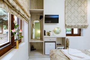 Kuchyň nebo kuchyňský kout v ubytování Konmari Boutique Suites