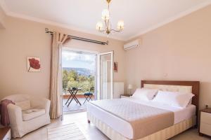 Ένα ή περισσότερα κρεβάτια σε δωμάτιο στο VILLA ALEXANDRA