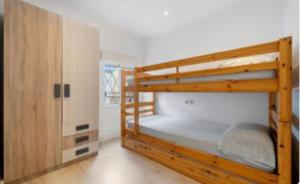 Postel nebo postele na pokoji v ubytování Petit Salou