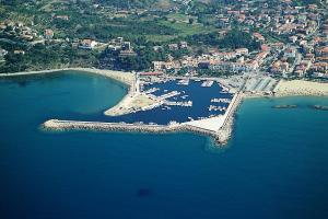 an aerial view of a harbor with boats in the water at RAYO DE SOL in Marina di Casalvelino
