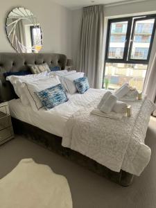מיטה או מיטות בחדר ב-5 Star Fistral View