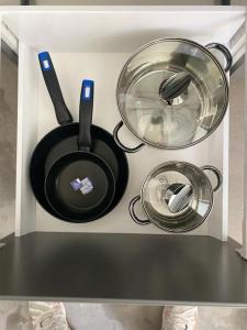 a kitchen with some appliances in a white box at Apto 2.Duplex con jardin.Centrico- in Villanueva de la Cañada +17 photos