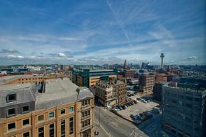 an aerial view of a city with buildings at Bright & Comfortable 2-Bedroom Central Flat with Parking in Liverpool