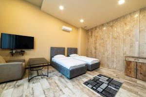 Letto o letti in una camera di B H Y Guesthouse in Yerevan