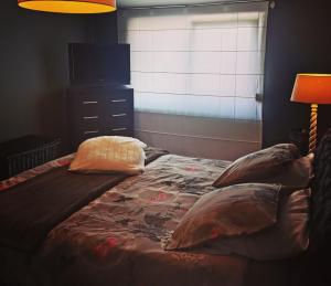 Postel nebo postele na pokoji v ubytování La Constance