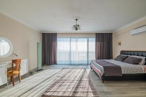 Postel nebo postele na pokoji v ubytování Beyza Villa