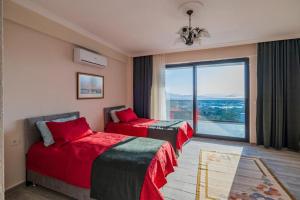 Postel nebo postele na pokoji v ubytování Beyza Villa + 37 fotografií