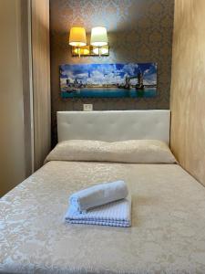Postel nebo postele na pokoji v ubytování Mille Guest HOUSE