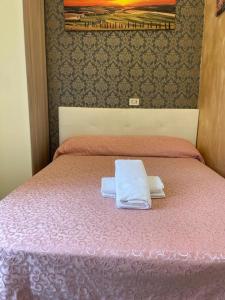 Postel nebo postele na pokoji v ubytování Mille Guest HOUSE