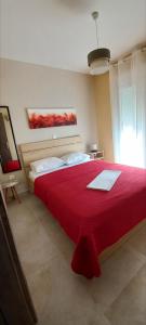 Postel nebo postele na pokoji v ubytování Aggeliki's Apartments