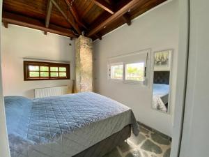 Postel nebo postele na pokoji v ubytování Kineta luxury House + 33 fotografií