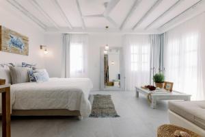 Postel nebo postele na pokoji v ubytování Athina Studios and Suites Plaka + 37 fotografií