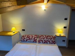 Postel nebo postele na pokoji v ubytování Appartamento Concei