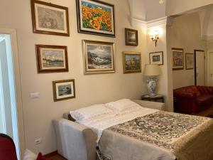 Postel nebo postele na pokoji v ubytování B&B Ai Due Santi + 29 fotografií