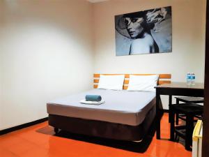 Letto o letti in una camera di Hotel California Suite