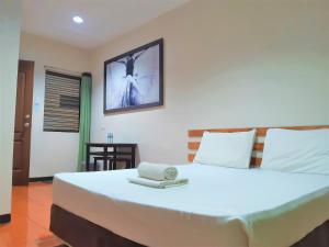 Letto o letti in una camera di Hotel California Suite