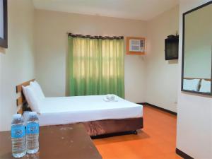 Letto o letti in una camera di Hotel California Suite