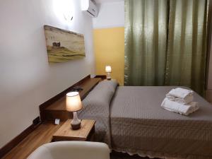 Postel nebo postele na pokoji v ubytování B&B Albachiara