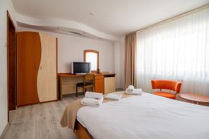 Postel nebo postele na pokoji v ubytování Complex Paloma Coral