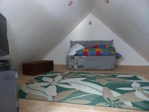 TV a/nebo společenská místnost v ubytování Gîte le Nid du Colibri - 12 pers