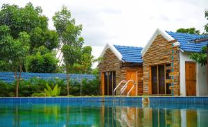 Bazén v ubytování Kaadgal Resort nebo v jeho okolí