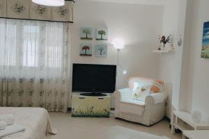 TV i/ili multimedijalni sistem u objektu CA'Sabella, ideale per sentirsi come a casa!