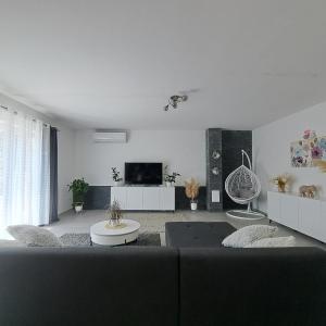TV a/nebo společenská místnost v ubytování Villa Rita