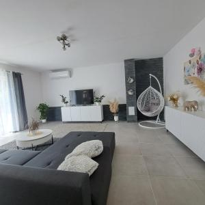 TV a/nebo společenská místnost v ubytování Villa Rita