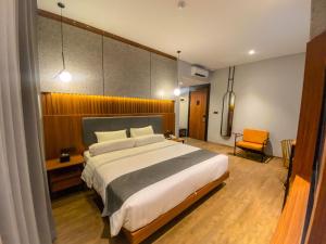 Postel nebo postele na pokoji v ubytování Nata Azana Hotel Solo