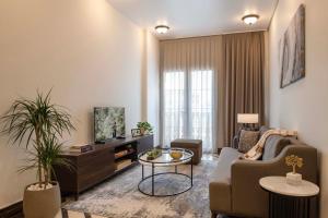 Uma área de estar em Somerset Al Mansoura Doha
